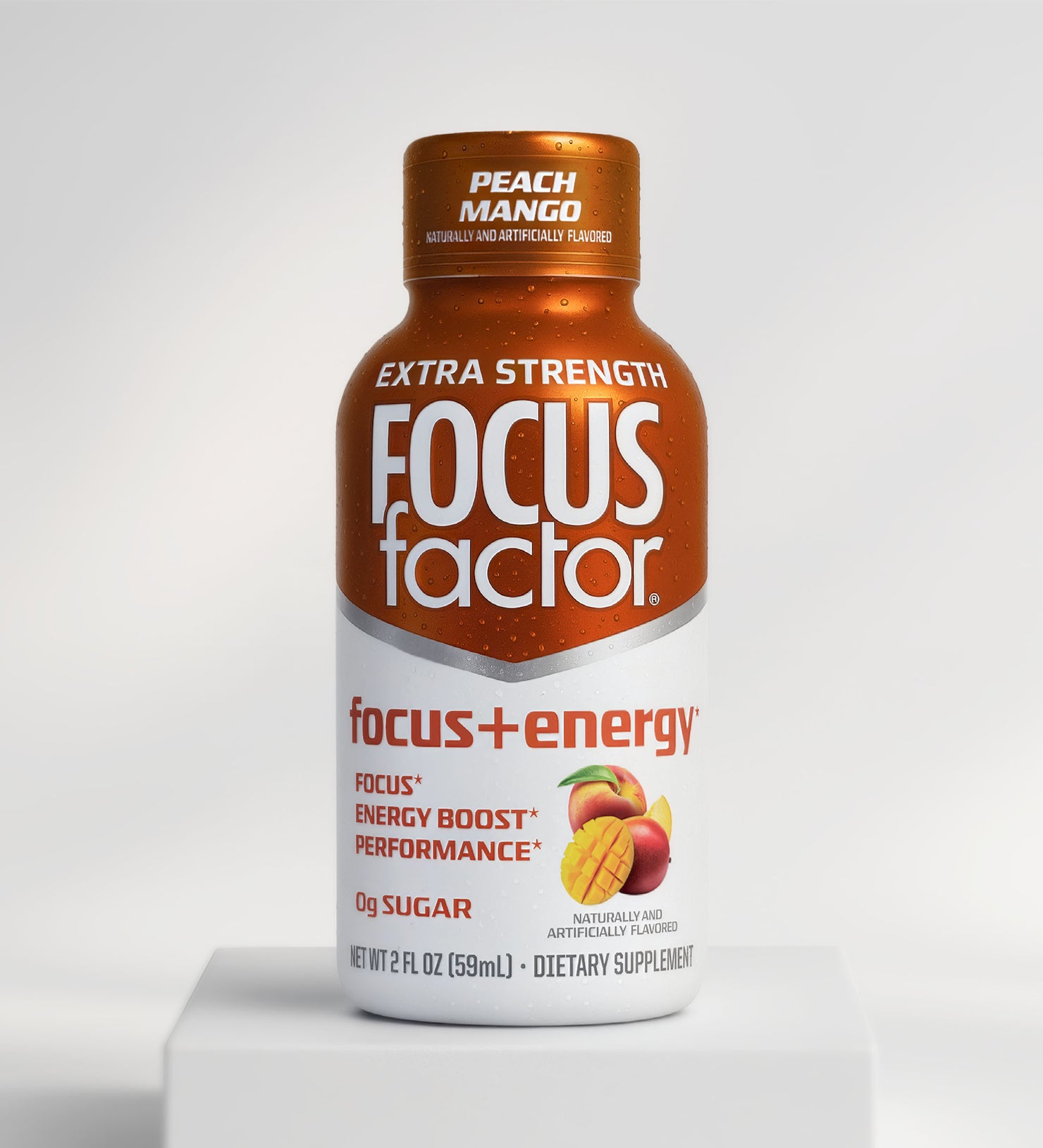 A Focus + Energy Shot - Extra Strength in Peach Mango Flavor from Focus + Energy, featuring peach and mango graphics and labels for focus support, energy boost, 0g sugar, and performance benefits.