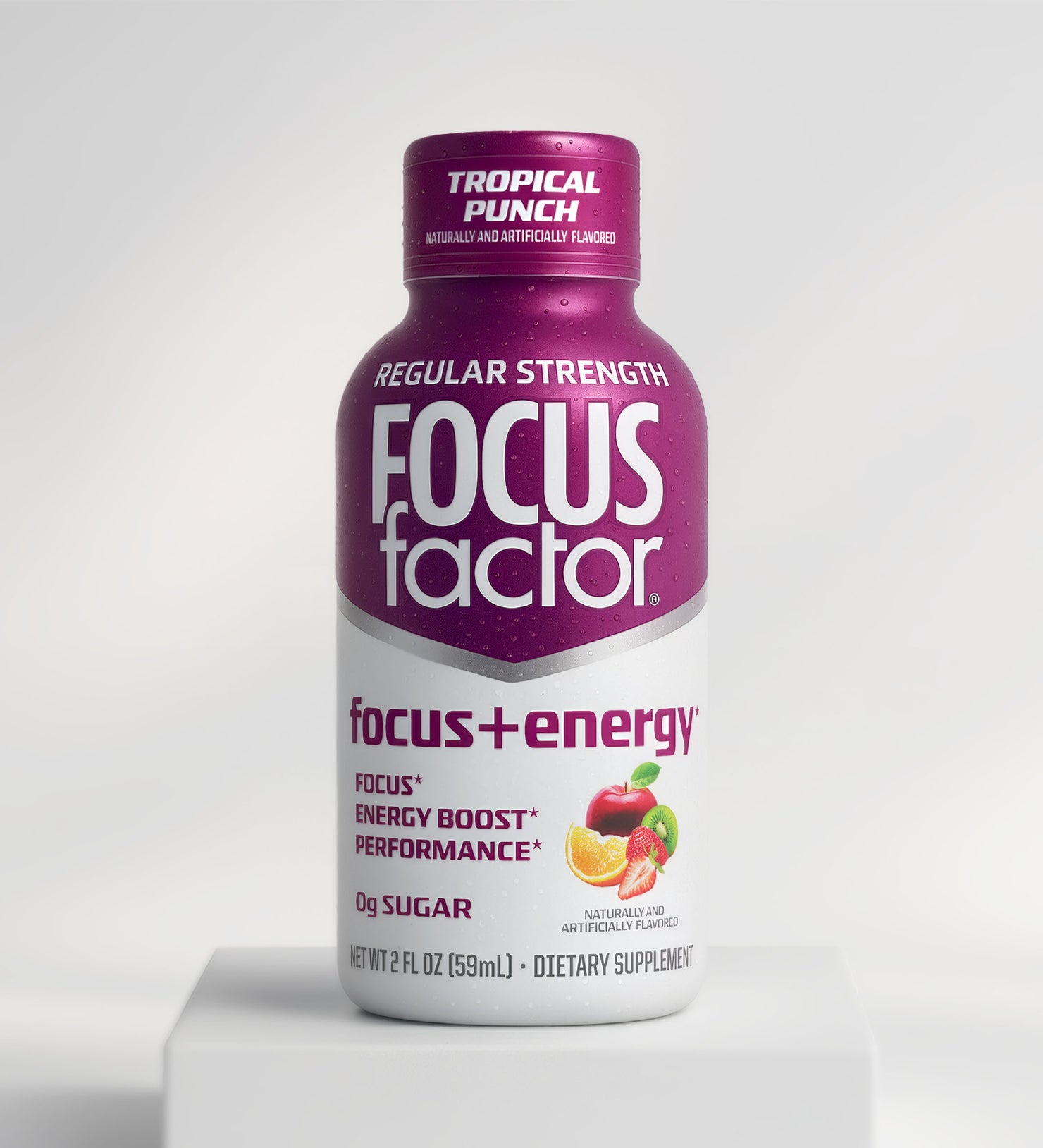 A Focus + Energy Shot - Regular Strength in Tropical Punch Flavor by Focus + Energy, with a purple and white label, fruit images, and text promoting focus, energy boost, performance, and 0g sugar.